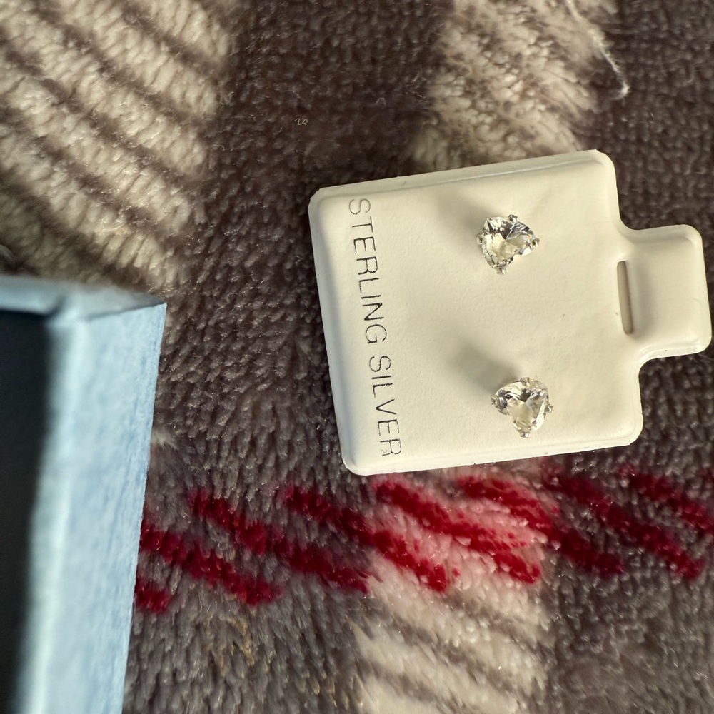 Sterling Silver Stud Earrings and a smaller pair of of Moissanite Earrings both